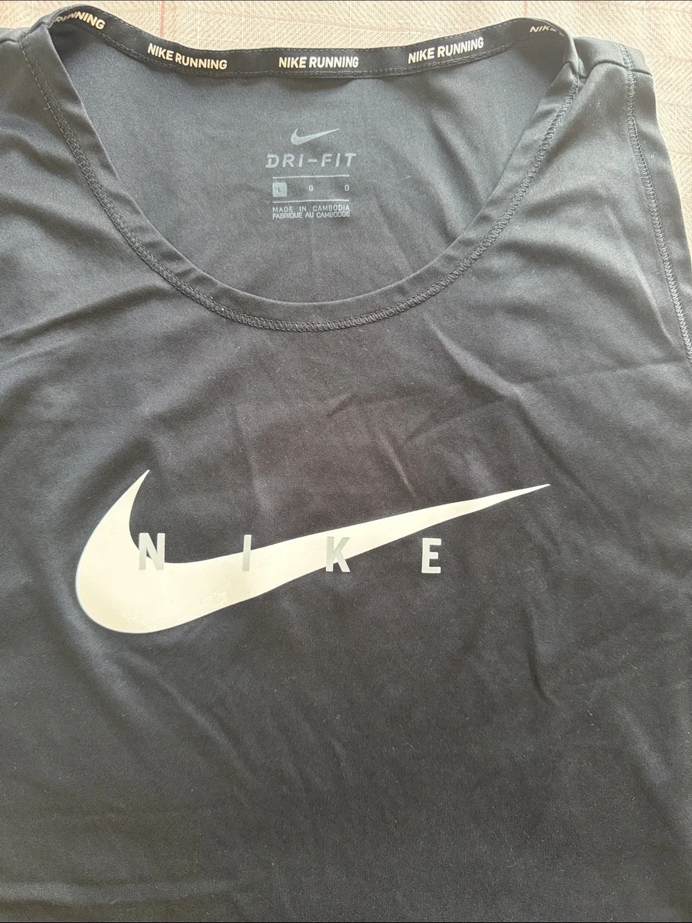 Nike women’s Black Dri-FIT Running Tank Top